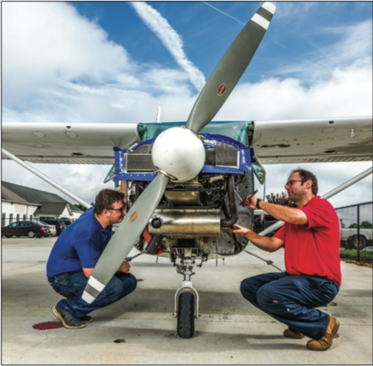 FIXER UPPER — Students also have the opportunity to pursue degrees in aviation maintentance or safety management. Photo Credit: Joel coleMan