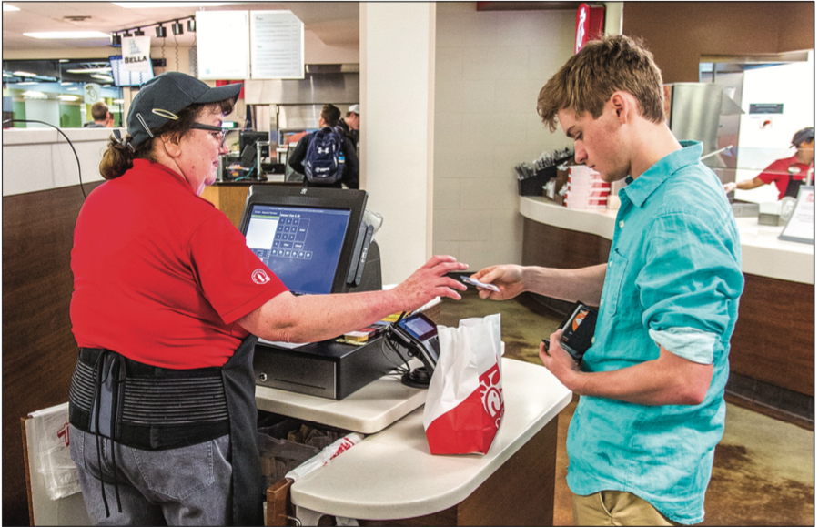 CHA-CHING — Students have commonly used Flames Cash to make purchases at on-campus venues such as Chick- l-A. Photo Credit: Denton Day