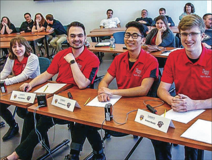 SWEEP — Liberty’s Varsity Quiz Bowl Team went undefeated in all four of its matches against Big South opponents during the conference tournament at Radford Feb. 25. PHOTO PROVIDED