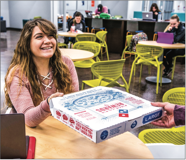 DELISH — JoyRun users can request a delivery to their dorm, of ce or favorite study space. SAUPPE is a feature reporter. KirKland Gee | liberty Champion CONVENIENT — Users pay for their food and delivery through the app with debit or credit. Photo Credit: KirKland Gee