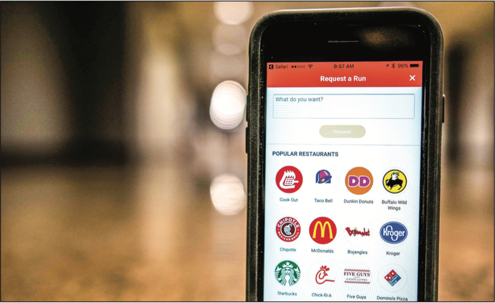 CONVENIENT — Users pay for their food and delivery through the app with debit or credit. Photo Credit :KirKland Gee