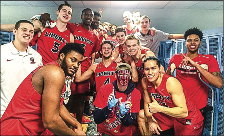 FAMILY — J.J. McCracken has never missed a Flames or Lady Flames home basketball game. Photo Provided