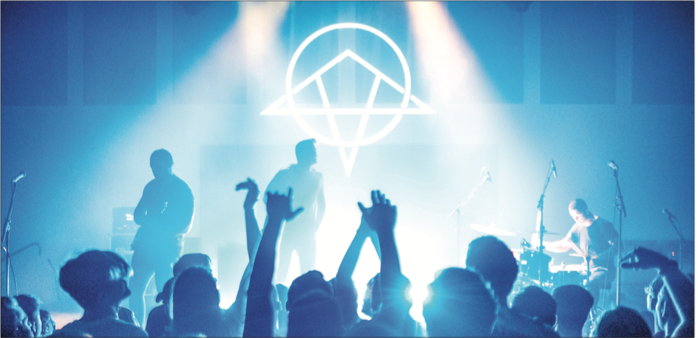 A HEAD-BANGING GOOD TIME — Christian metal band Oh, Sleeper took the stage with two other metal bands in a performance that attracted a devoted following of Liberty students. Photo Credit: Nathan Spencer