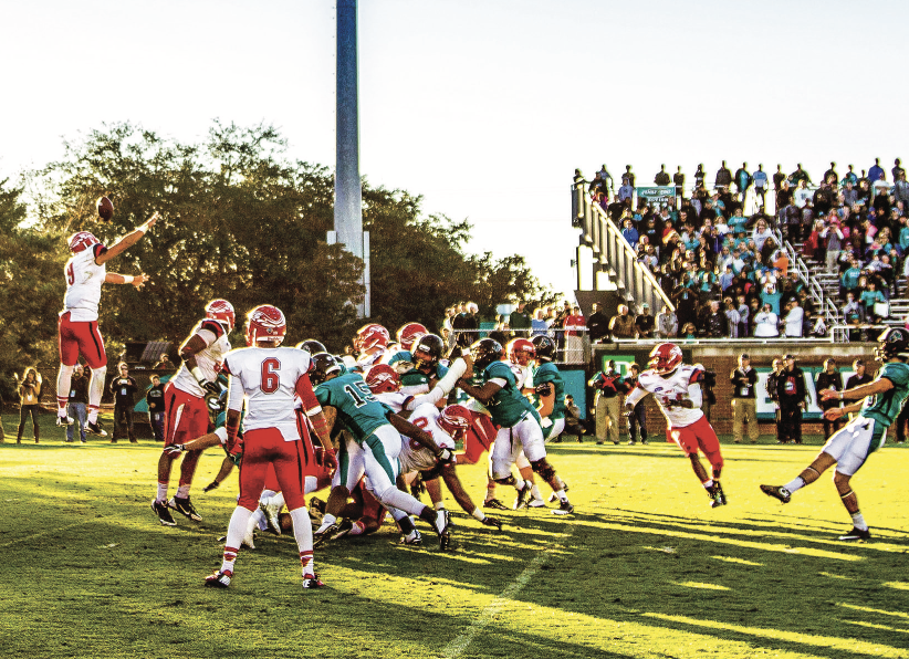 The Flames defeated Coastal Carolina Nov. 14, 2014 to win the Big South Conference. Photo Credit: Kevin Manguiob