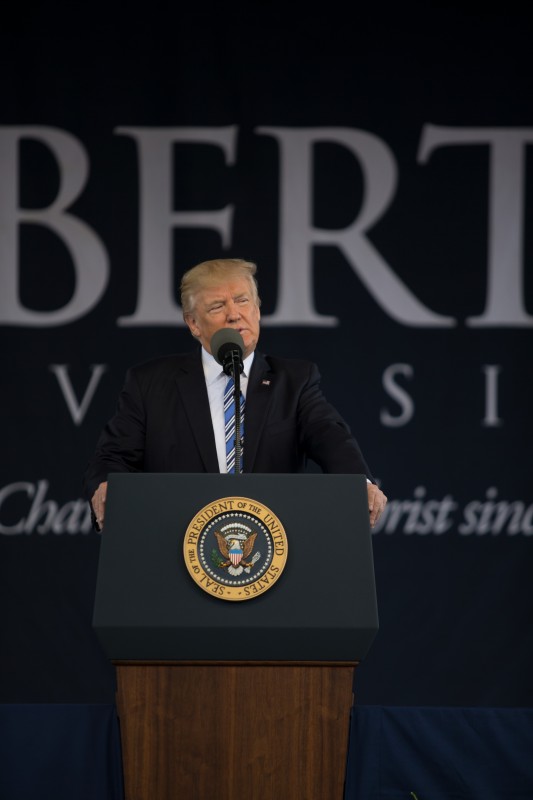 A record crowd of over 50,000 attendees came out to support the graduates and catch a glimpse of President Trump. Photo by Dean Hinnant