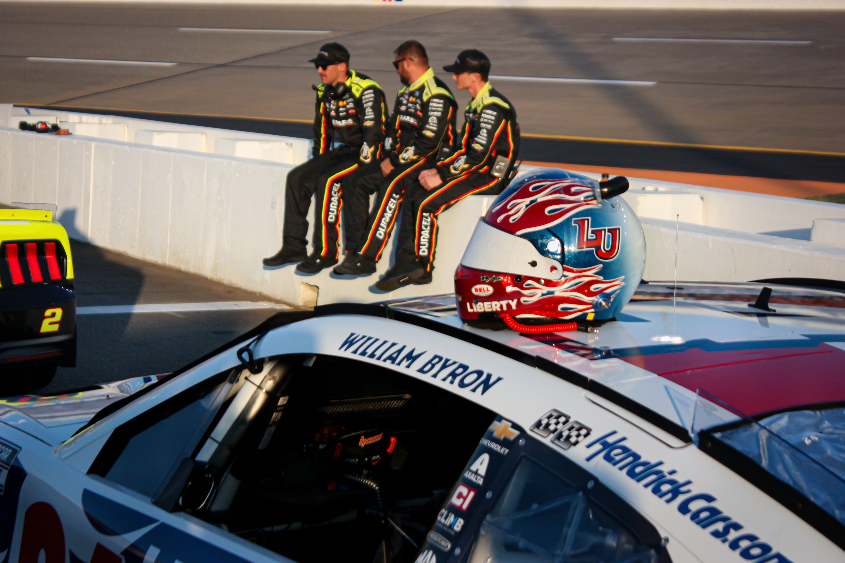 William Byron fights through a collision to claim the regular