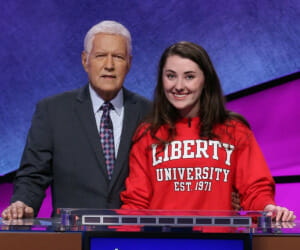 Natalie Hathcote, one of Liberty's Varsity Quiz Bowl Players, with Alex Trebek from when she appeared on College Jeopardy