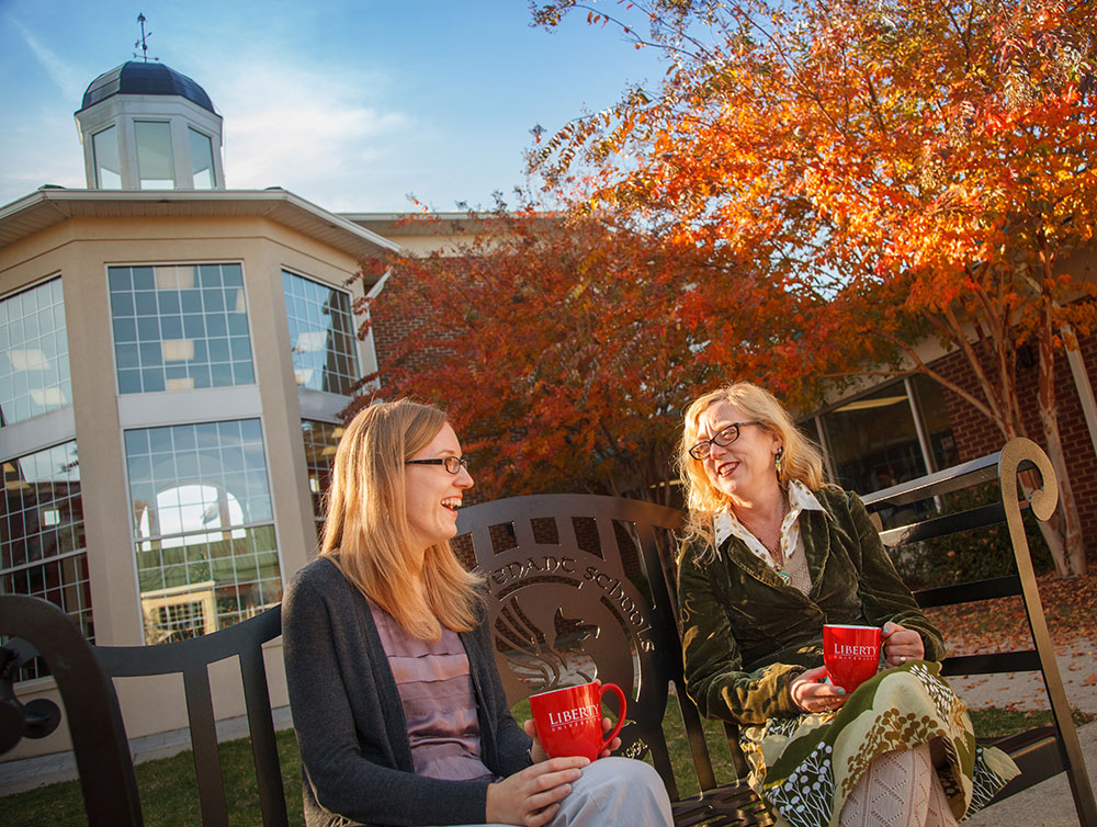 Dr. Karen Swallow Prior (right) with alumna Kyra Marken