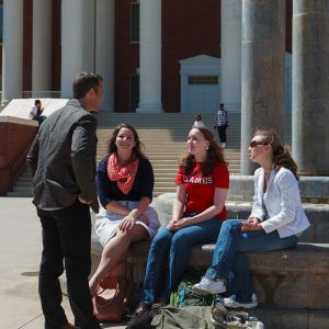 Cameron talks with students on a recent trip to Liberty's campus.