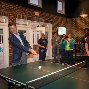 President Jerry Falwell, Jr. plays pingpong with students in the newly renovated David's Place.