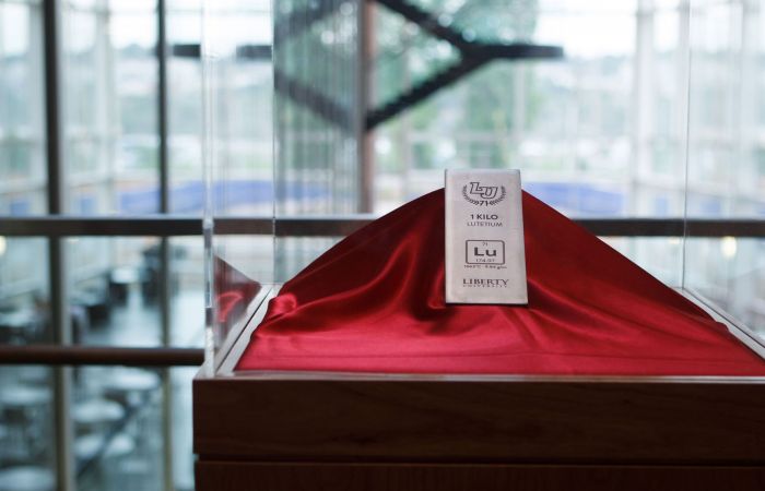 First, President Jerry Falwell described a 1-kilogram bar of Lutetium, a silvery white metal obtained by Director of Purchasing Jamie Hill and engraved with Liberty’s wordmark that will be permanently displayed in the Jerry Falwell Library in honor of the Class of 2014.