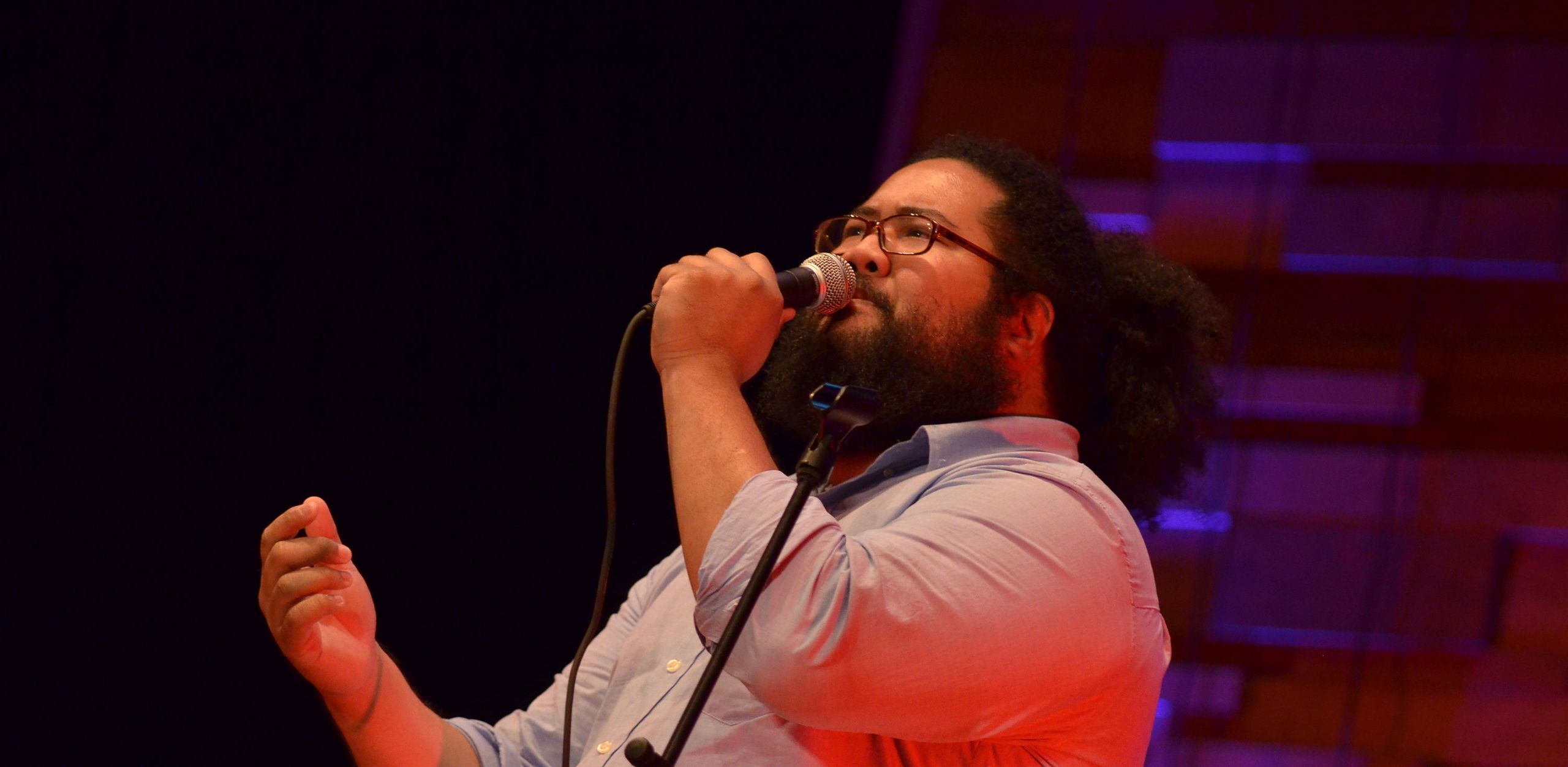 In front of a large crowd in a dim Nashville, Tenn., auditorium, blue and purple stage lights painted the stage as Setnick Sene (’15) commanded his rich, smooth voice.