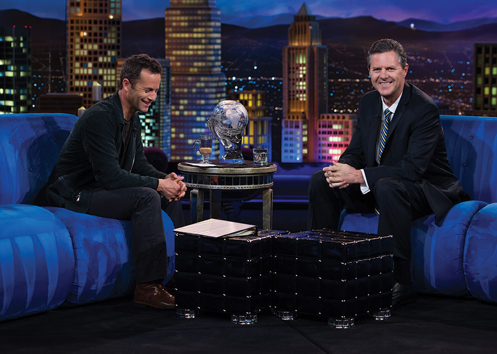 Cameron interviews Chancellor Jerry Falwell, Jr. on the set of Trinity Broadcasting Network's "Praise the Lord" television show. 