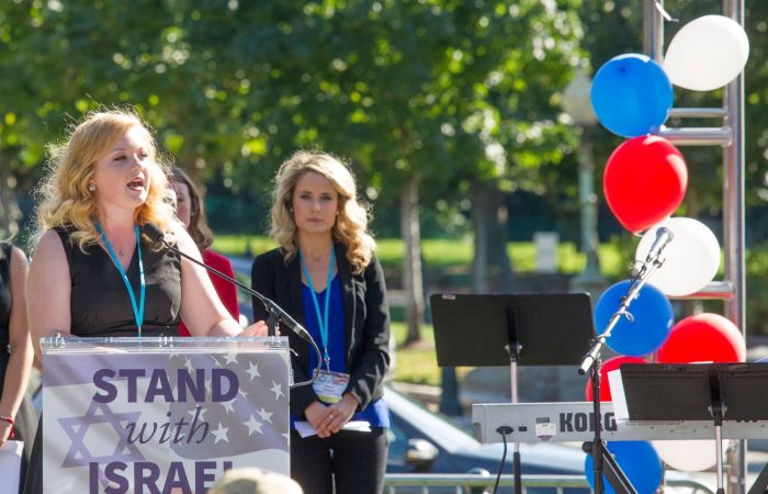 Chelsea Andrews speaks at a Stand with Israel rally.