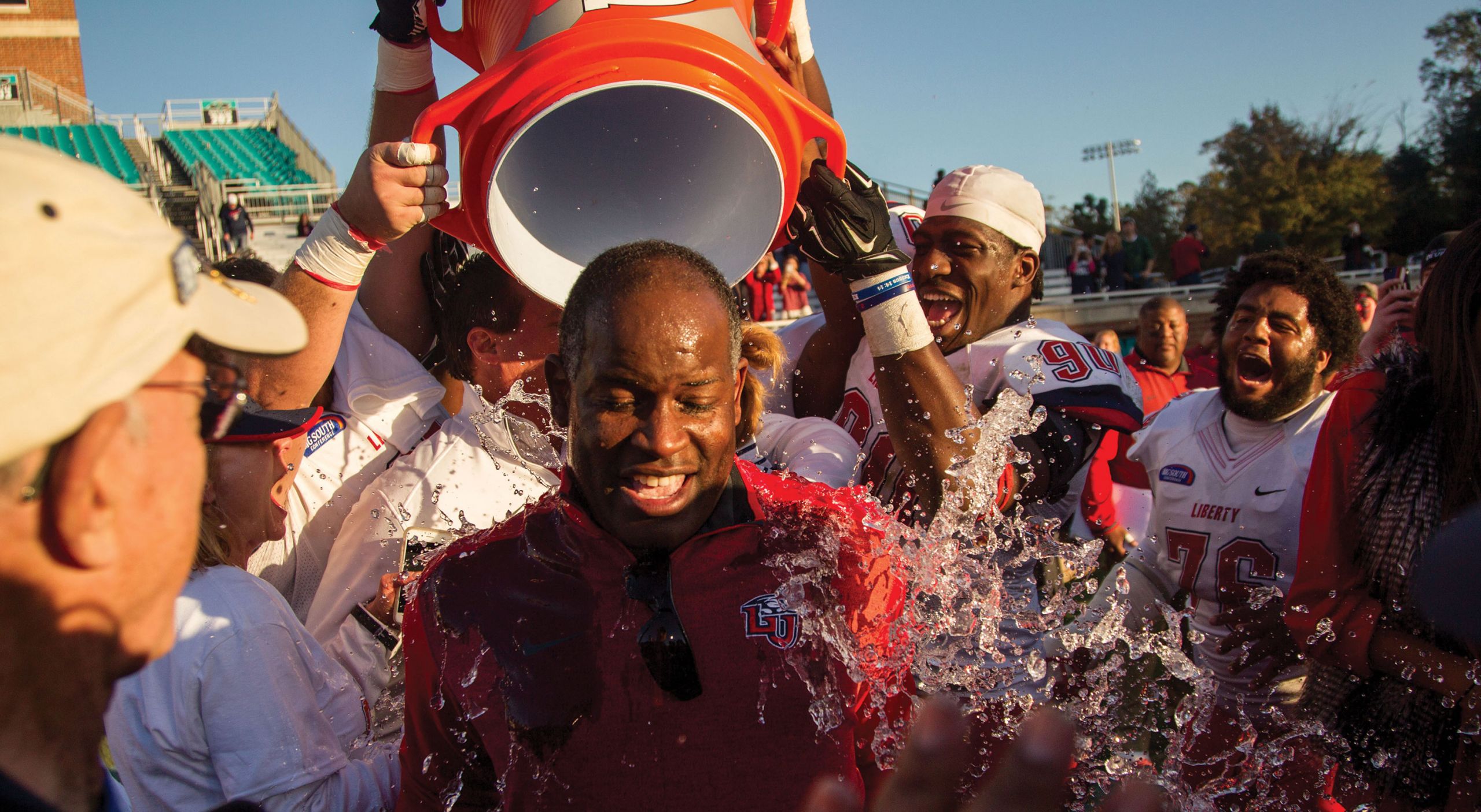 Flames head coach Turner Gill gets doused after a big win.