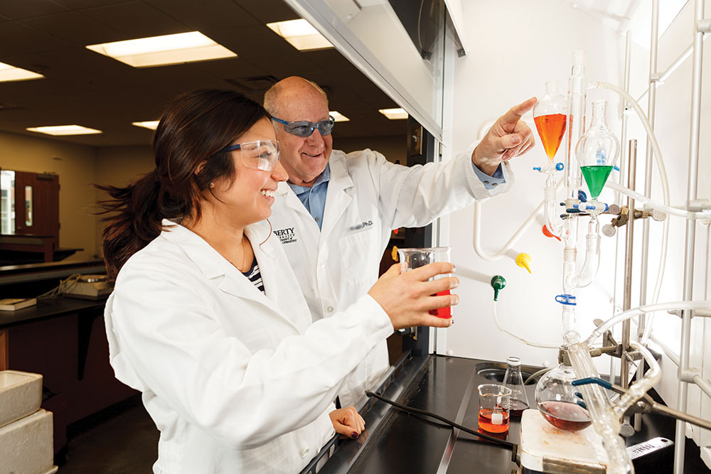 Biology student and professor work together at Liberty.
