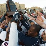 Liberty celebrates a Big South Conference football championship.