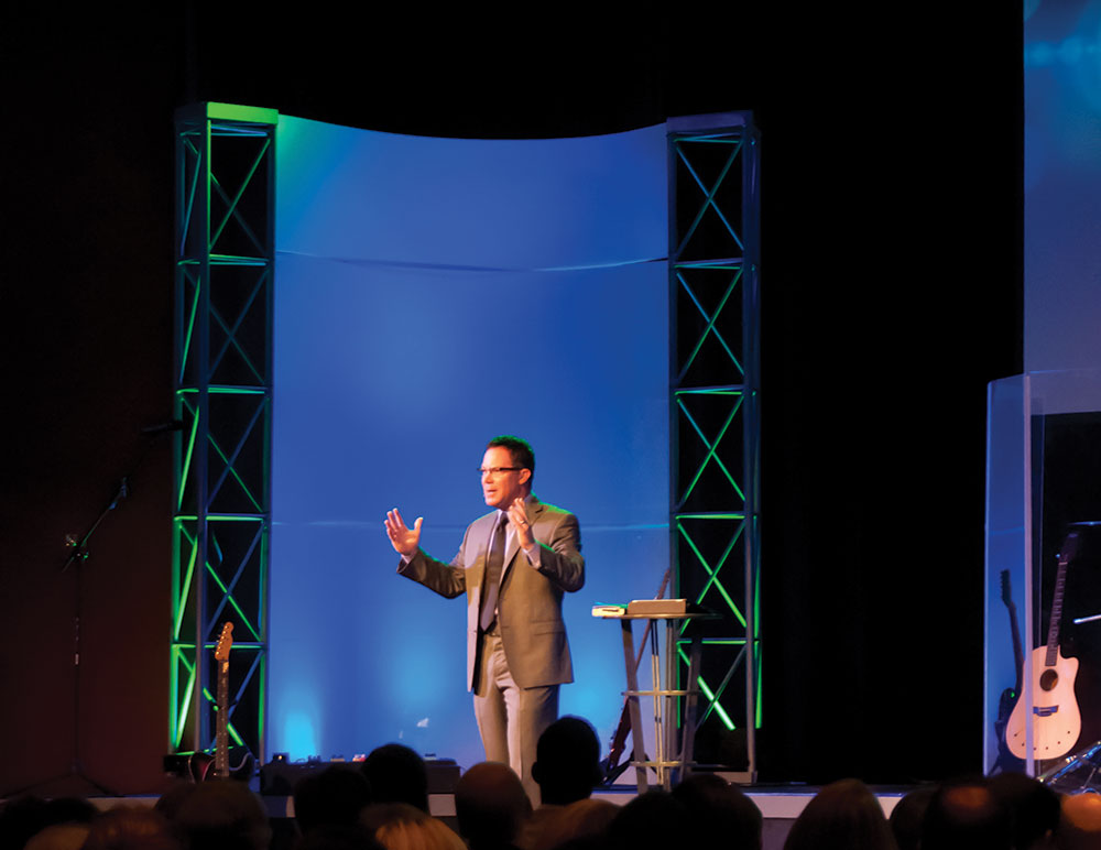 Rodney gage preaches at Fellowship of Orlando, which he founded in 2001. 
