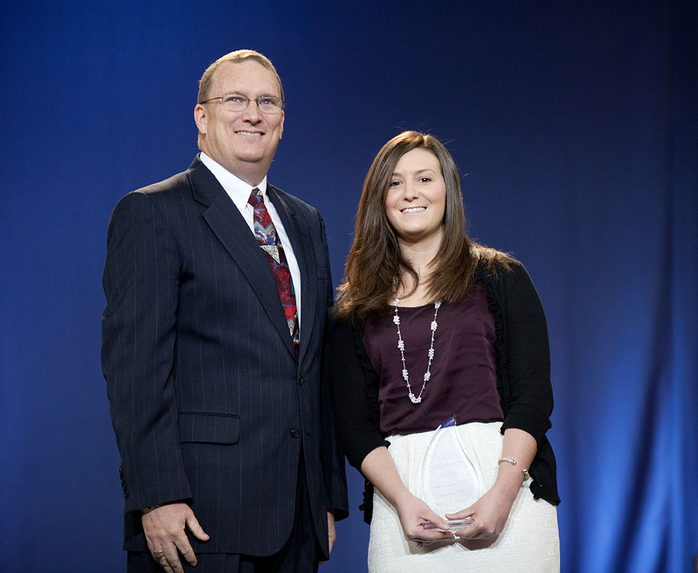 Heather Thomas (right) was named this year’s Christian/Community Service (CSER) Volunteer of the Year. Troy Matthews, associate director of CSER, presented the award.