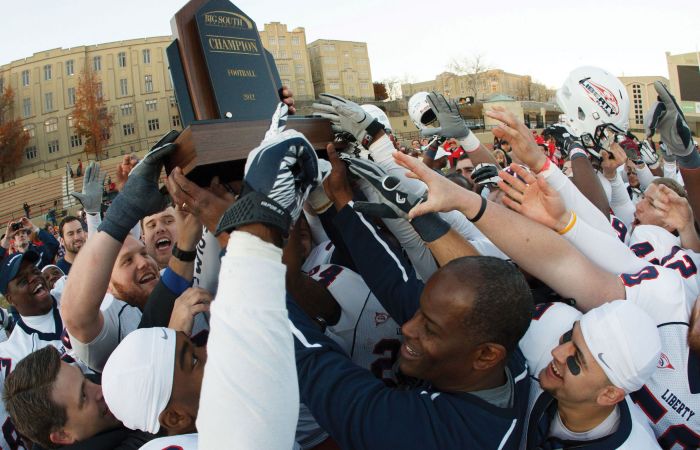 Liberty Flames football celebrates a Big South Conference Championship.