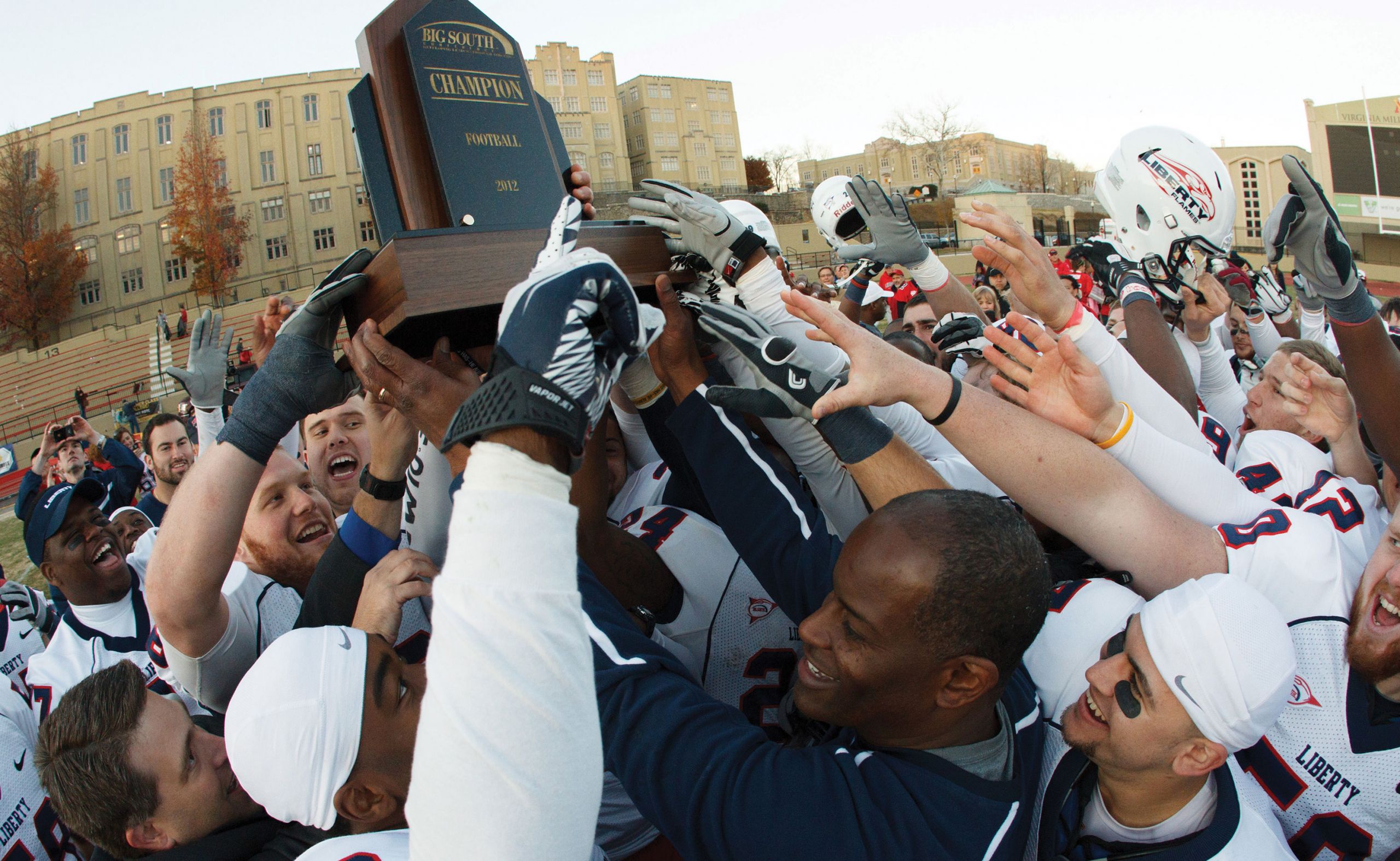 Liberty Flames football celebrates a Big South Conference Championship.