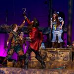 Hook and Pan duel on stage.