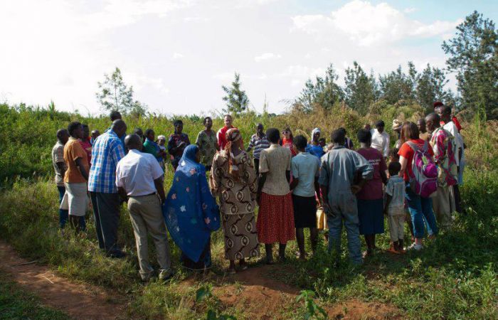 A team prays in Rwanda.