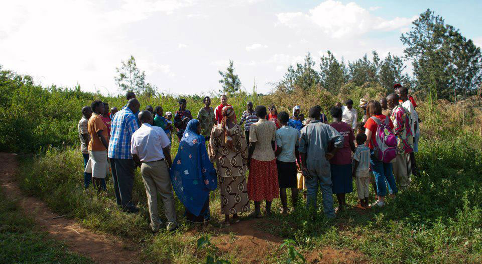 A team prays in Rwanda.