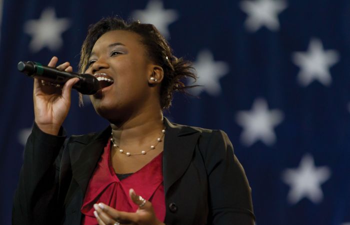 A Sounds of Liberty vocalist performs.