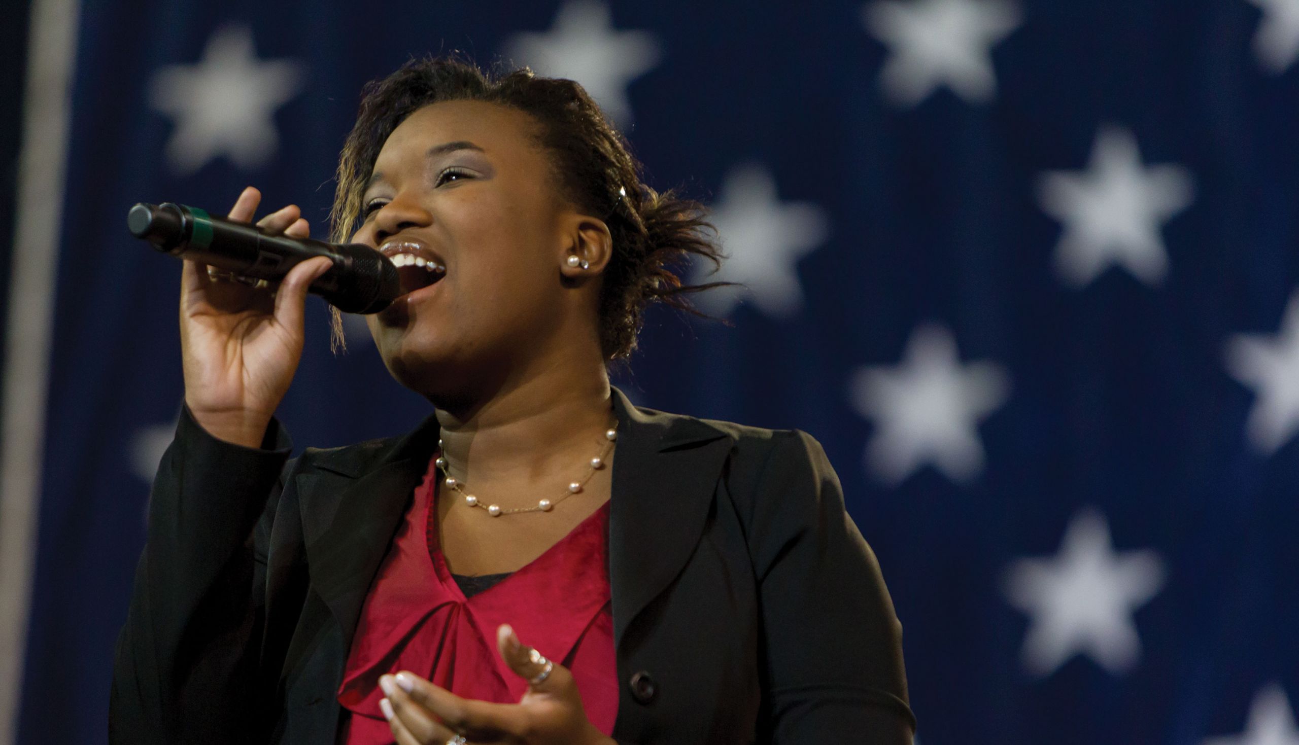 A Sounds of Liberty vocalist performs.