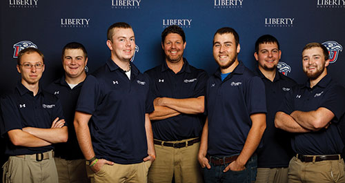 Second-year archery Head Coach Mitch Reno (center) has a quiver full of team members to draw from: Jason “Daddy” Lynch (from left), Chris “Porkchop” Britton, Hunter “Whistle Britches” Jacobs, Sam “Anger Management” Hatcher, Ian “Big Rig” Rigney, and Zach “Corkscrew” King.
