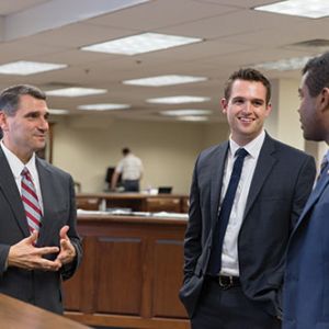 B. Keith Faulkner (left), dean of the Liberty University School of Law, converses with first-year law student Benjamin Allison and second-year law student Jonathan Trotter in Liberty’s Ehrhorn Law Library.