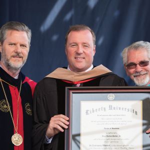 Dean Parker (’97), Chairman and CEO of Vita Capital, is awarded an Honorary Doctor of Business.
