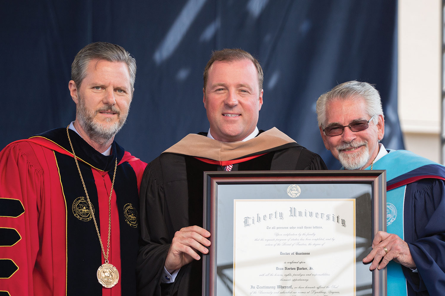 Dean Parker (’97), Chairman and CEO of Vita Capital, is awarded an Honorary Doctor of Business.