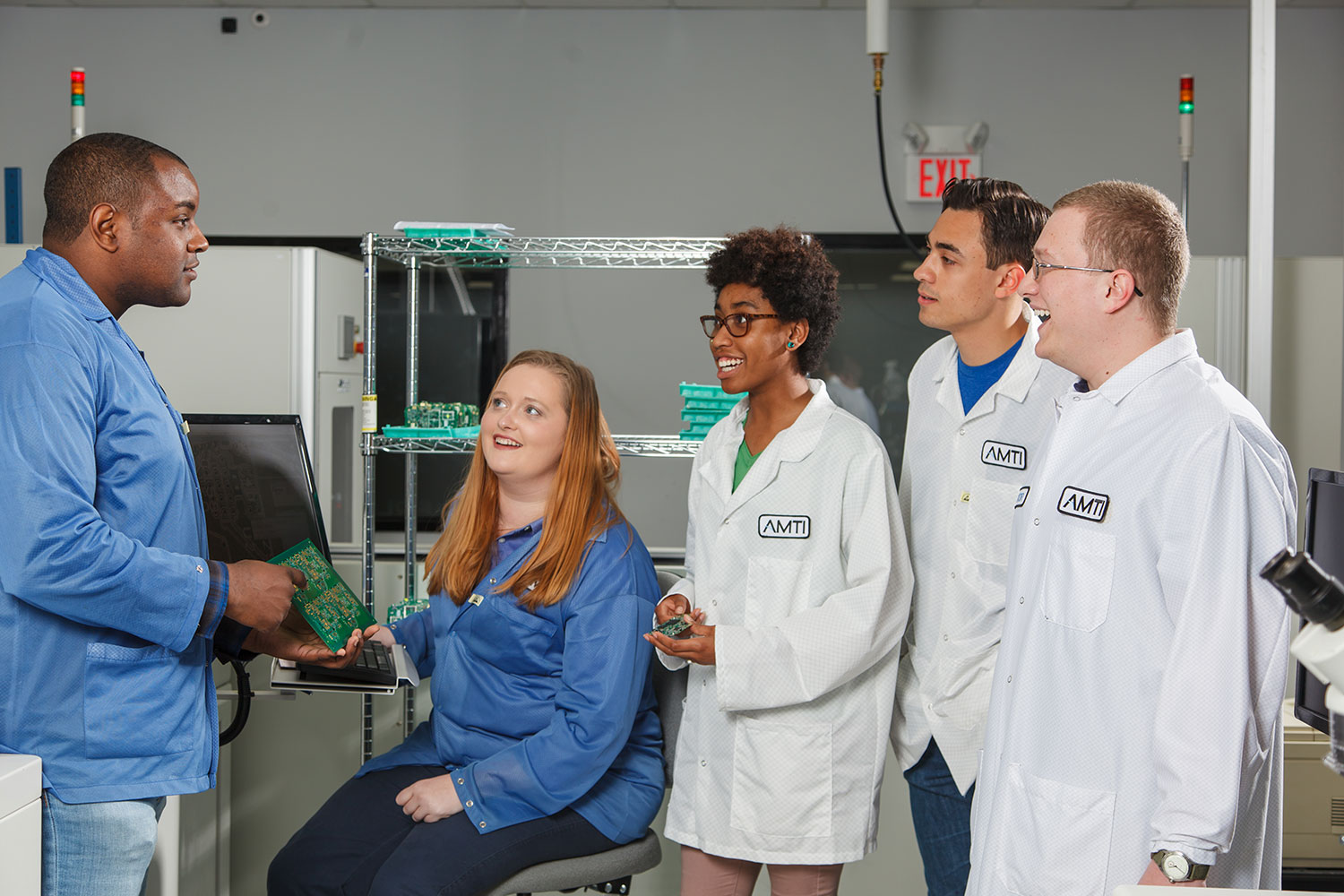 The software and electronics team works in a lab at AMTI.