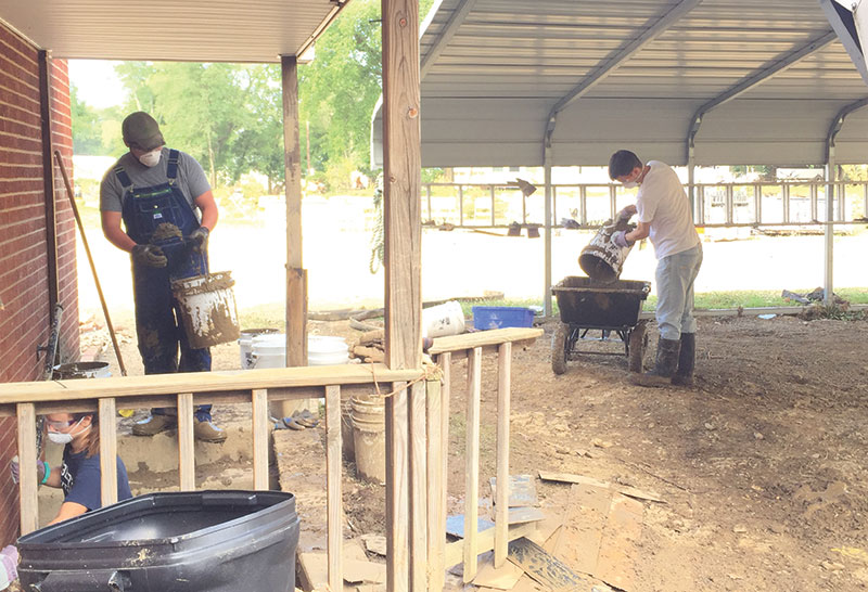 Students worked to clean out homes in West Virginia.