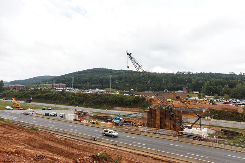 Construction begins on a bridge over U.S. 460 across Liberty University's campus.
