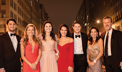 Liberty President Jerry Falwell (right) and his family attended the Liberty Inaugural Ball. From left, Trey and Sarah Falwell, Caroline Falwell, Laura and Wesley Falwell, and Becki Falwell.