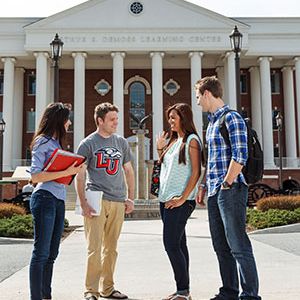 Liberty University President Jerry Falwell announced several new aid programs and an additional investment in an existing program that will provide more financial aid to high-achieving students beginning in Fall 2014.