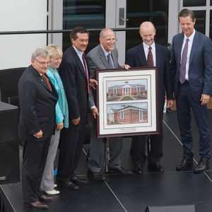 LUCOM presents an official drawing of the Center for Medical and Health Sciences to the members of the Virginia Tobacco Commission.