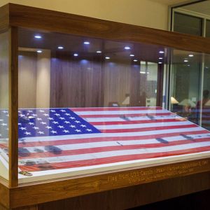 An American flag from a WWII naval destroyer, the USS Cassin, is now on display — oil-stained and bullet-scarred from the attack on Pearl Harbor — at the Jerry Falwell Library.