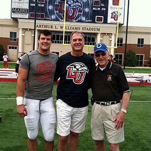 Garrett Long, grandson of Albert Long, is now in his junior year as a tight end for the Flames (#81) and was playing on Kenan field for Liberty’s highly anticipated season opener.
