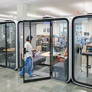 Student entering a study pod in the Jerry Falwell Library