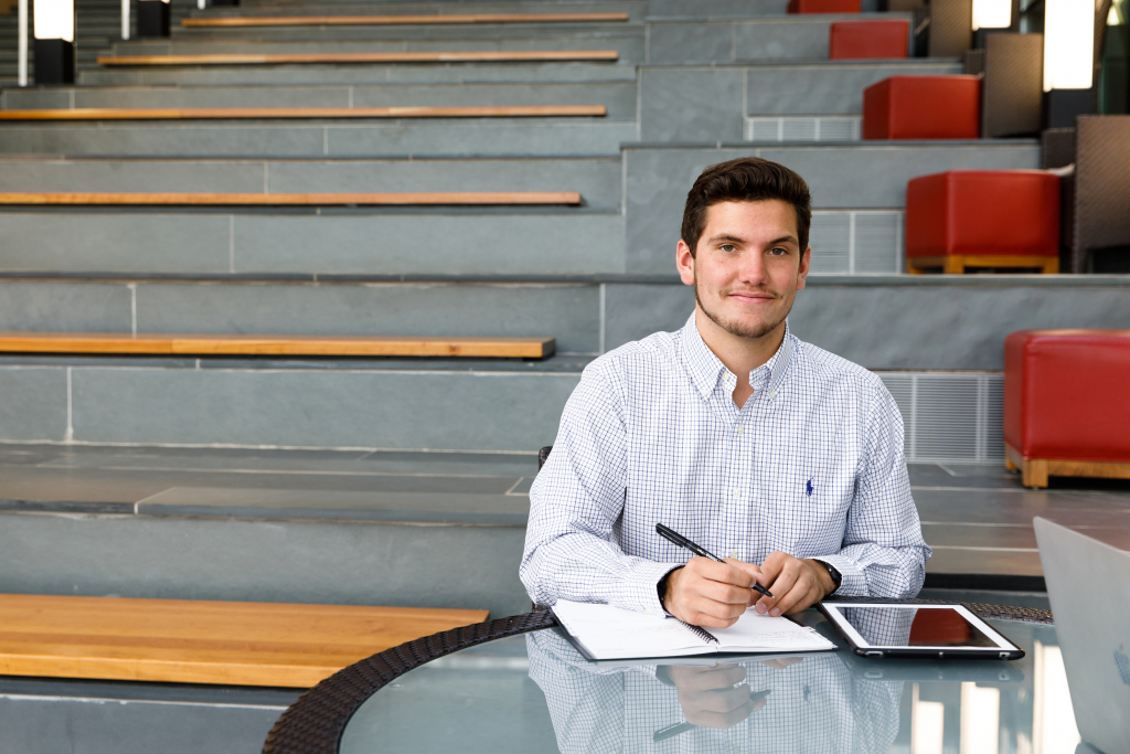 Photo of student in lower atrium