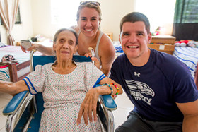 LUCOM student-doctor Joshua Reynolds, 2018, pictured with an elderly woman at Hope of Life International in Guatemala.