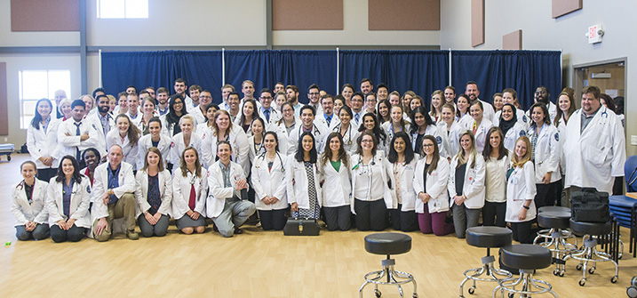 LUCOM student-doctors, faculty and physicians gather for group photo during medical outreach in Martinsville, Va.