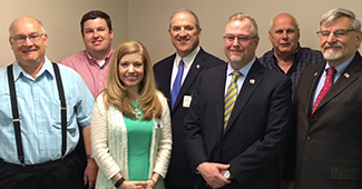LUCOM and PRMC, affiliate group