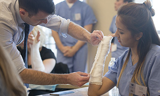 LUCOM-Student Osteopathic Surgical Association (SOSA) hosts interactive splint workshop.