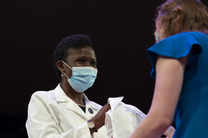 Liberty University osteopathic medical students, Class of 2024, are coated during LUCOM's seventh White Coat Ceremony.