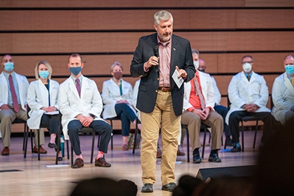 Liberty University Provost Scott Hicks, PhD, addresses the Class of 2025 during annual White Coat Ceremony on Saturday, Aug. 21, 2021.